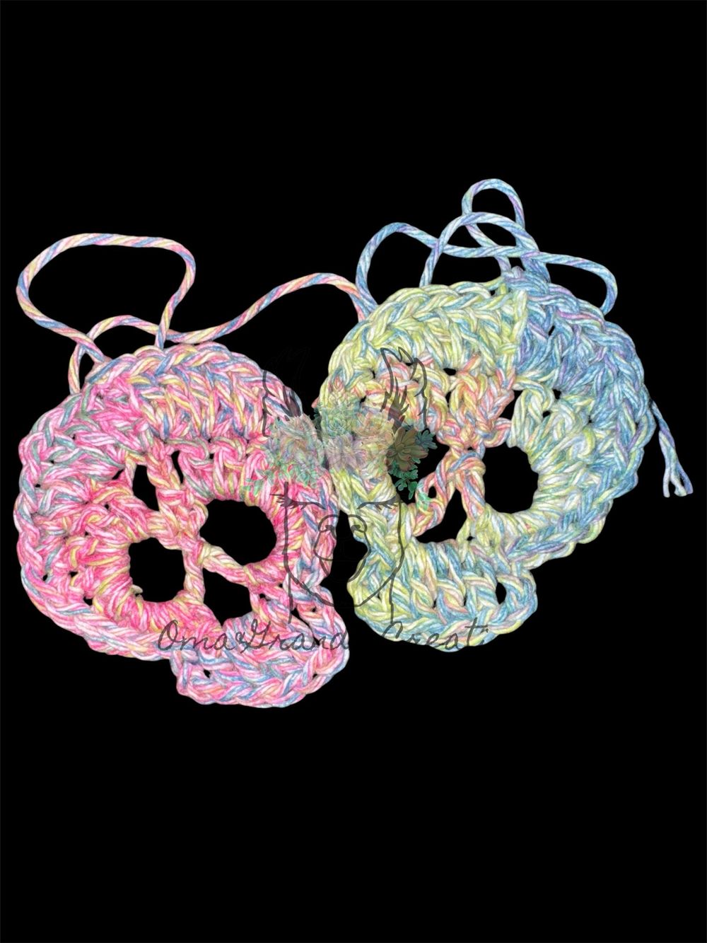 A Pair of Crocheted Skulls - Haute Pink 
