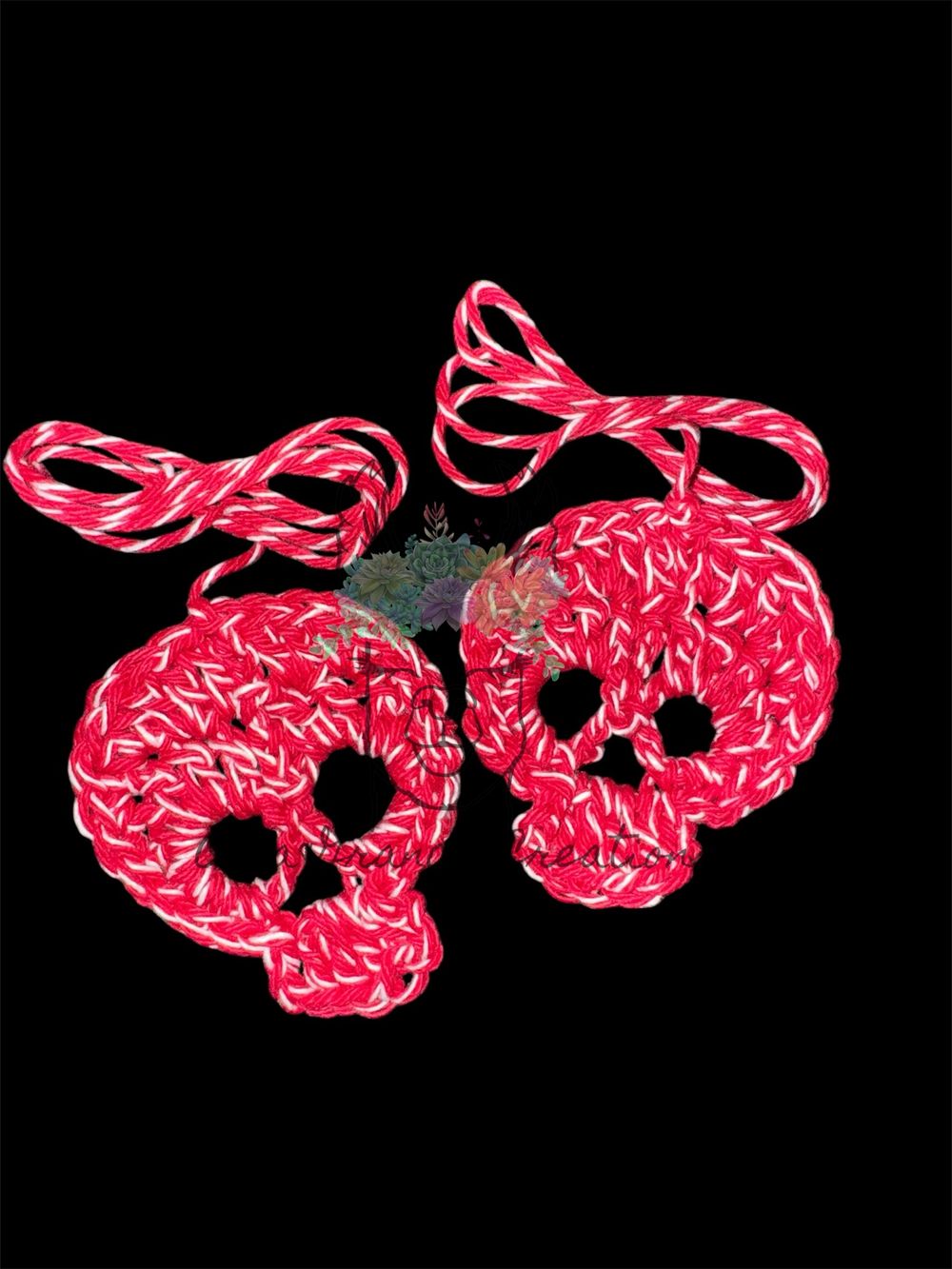 A Pair of Crocheted Skulls - Red & White Twist