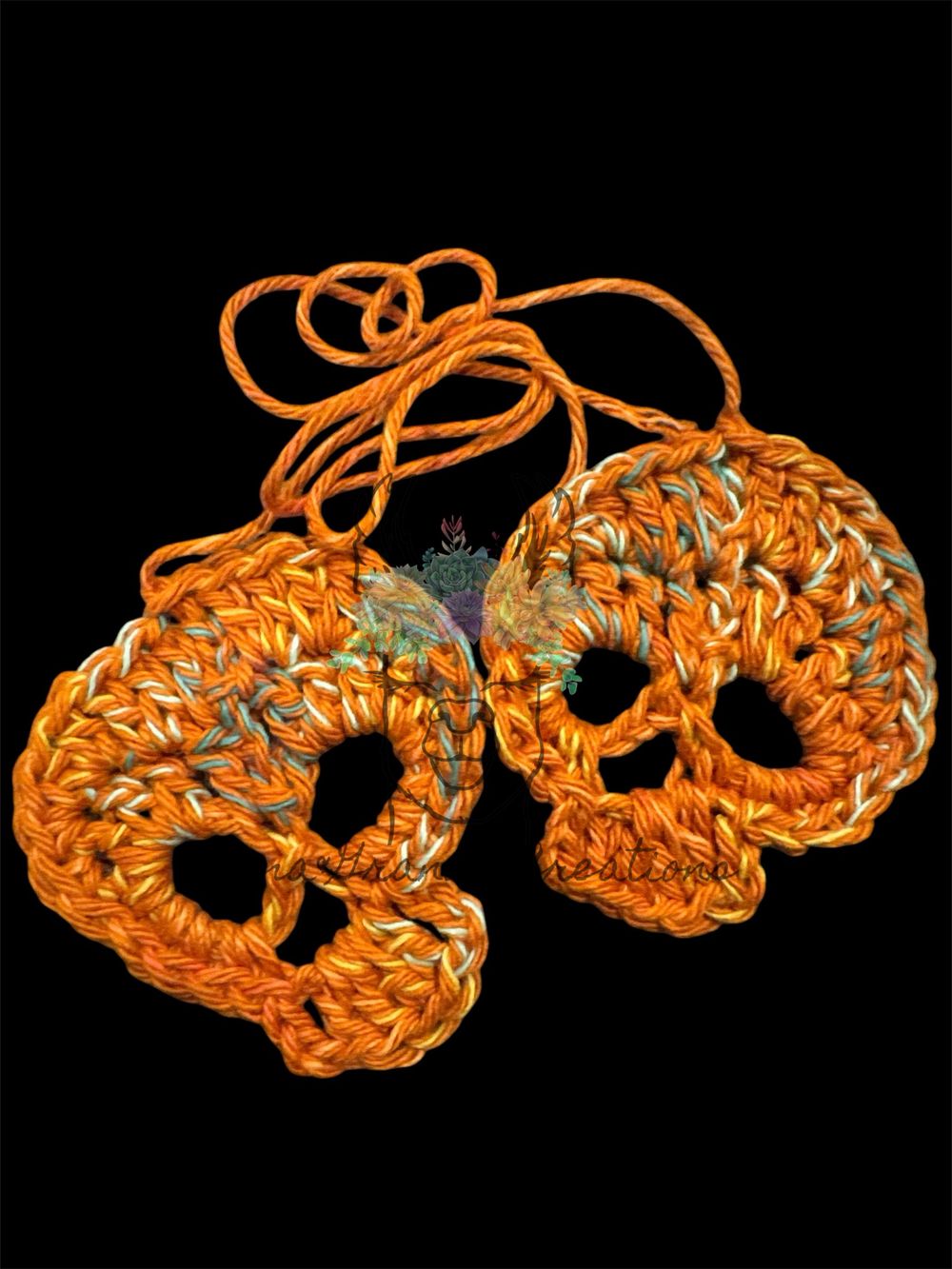 A Pair of Crocheted Skulls-AuburnClay